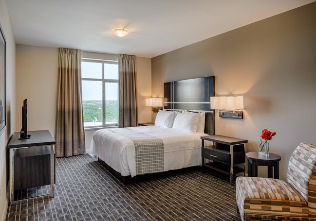 Spacious bedroom with adjoining full bath - Broadway Plaza - Mayo Clinic