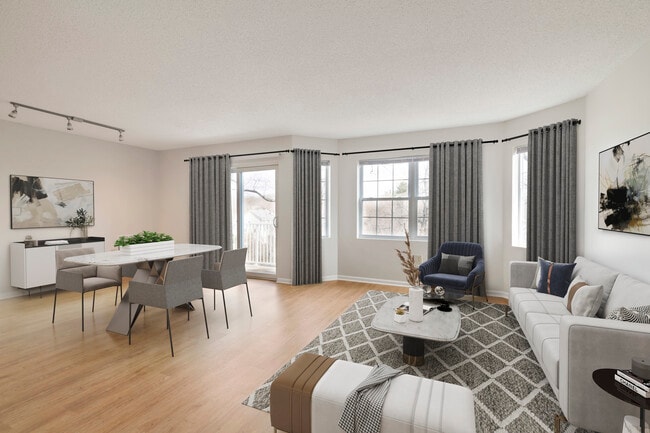 Renovated Package I living and dining room with hard surface flooring - Avalon Burlington