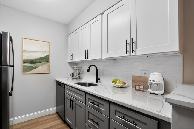 Elevate your living at Bay Ridge at Nashua Apartments, where modern kitchens meet sleek finishes. Enjoy ample space and stylish design perfect for your lifestyle. Ready to make this your new home? Contact us today for more information! - Bay Ridge at Nashua Apartments