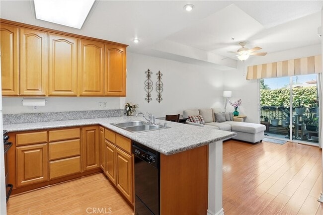 Building Photo - 17888 Alburtis Ave Unit A105