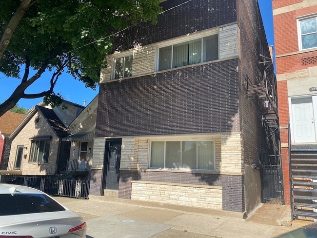 Building Photo - 3145 S May St Unit 2R