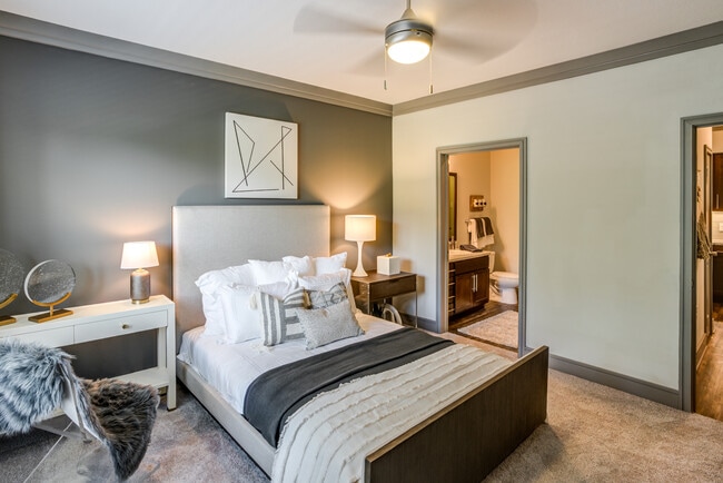 Retreat to a bedroom built for relaxation - Adara Alexander Place