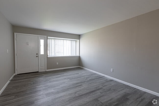 2BR, 1.5BA - Living Room - Windsor Crossing