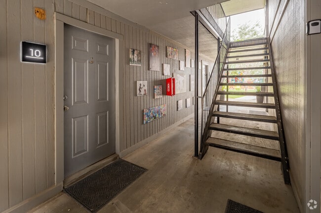 Wall Art and Entrance of Suites - 67th Suites