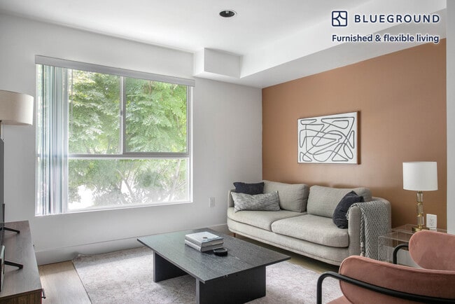 Building Photo - 1539 Beloit Ave Unit FL2-ID1076