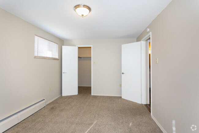 2BR, 1BA - 825SF - Primary Bedroom - Cedar West Apartments
