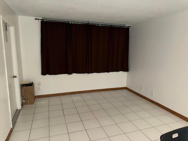 Photo - 9450 Live Oak Pl Unit 306