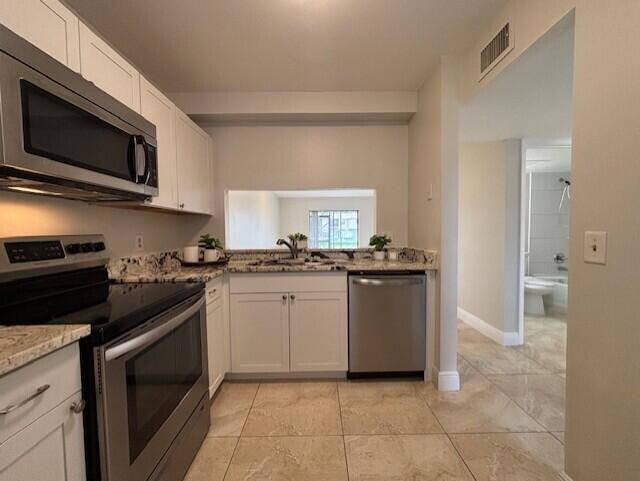 Building Photo - 6748 Palmetto Cir S Unit 1040