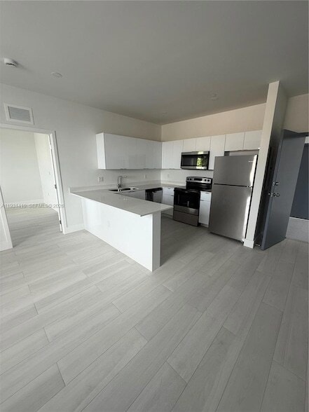 Photo - 1091 E 17th St Unit 301