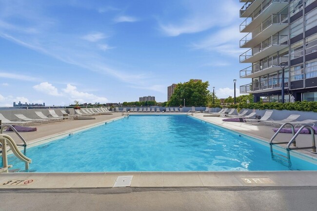 Building Photo - 6050 Blvd E Unit 16E