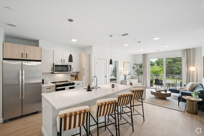 2BR, 2BA - 1,155SF - Kitchen/ Living Room - The Asher