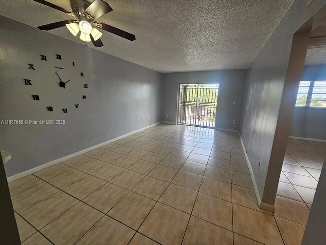 Building Photo - 10851 SW 2nd St Unit K310