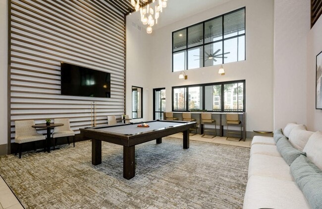 Elevate your lifestyle at The Edison Daytona Apartments with modern common areas designed for relaxation and socializing. Enjoy luxurious finishes and ample natural light. Don't miss out—schedule your tour today! - The Edison Daytona Apartments