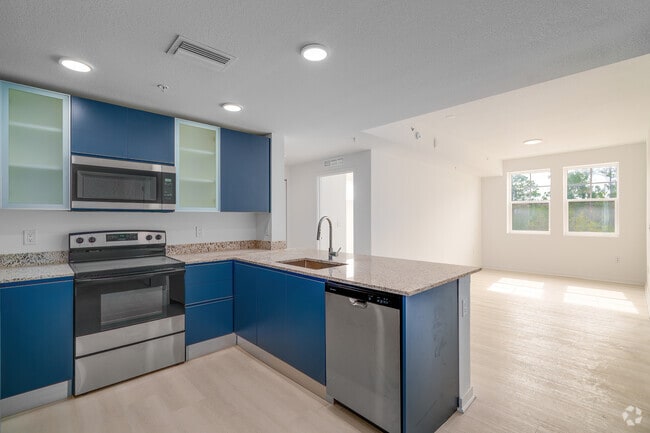 2BR, 2BA w/ Den - 1,085SF - Kitchen - Millenia Park Orlando