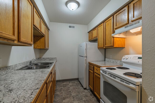 2BR, 1BA - 750SF - Kitchen - Springport Glen