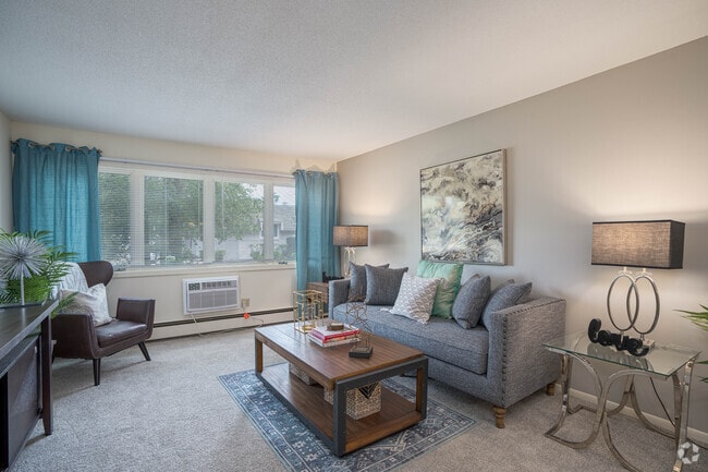 Classic 1BR,1BA - 700SF - Living Room - International Village Apartments