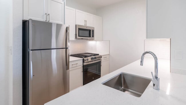 Kitchen with Stainless Steel Appliances - Fairchase
