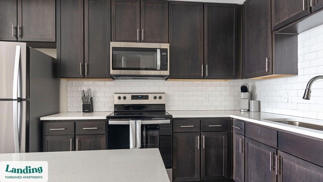 Building Photo - 9650 52nd Ave E Unit 1-206.1407528