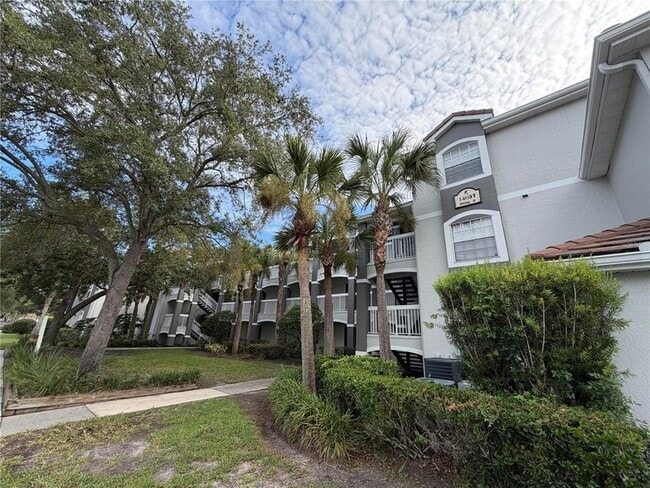Building Photo - 14037 Fairway Island Dr Unit 211