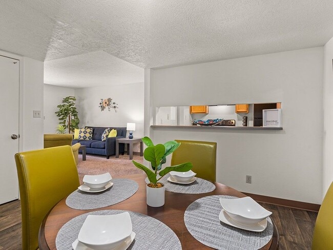 Dining Area with Connected Living Room - Mesa Ridge Apartments