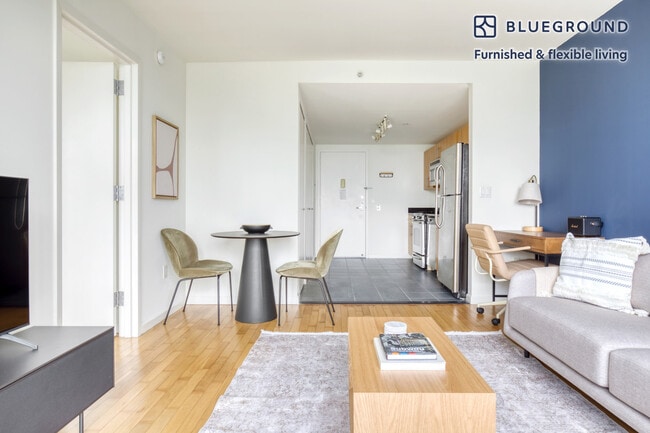 Photo - 4-75-75 48th Ave Unit FL33-ID852