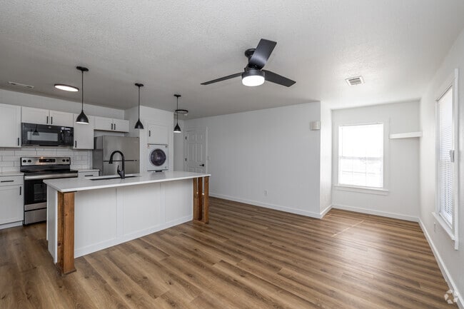 1BR, 1BA - 825SF - Living Room - Jayel Luxury Townhomes