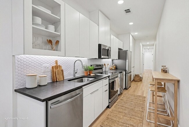 Building Photo - 2217 N Fitzhugh Ave Unit 101