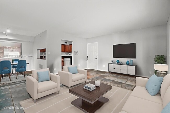 Building Photo - 3083 N Oakland Forest Dr Unit 206