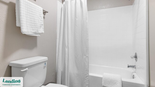 Building Photo - 6200 Rime Village Dr NW Unit 31-202.1410973