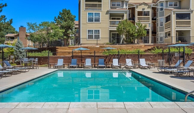 Relax and catch some rays at your resort-inspired pool and sundeck - Arcadia Apartment Homes