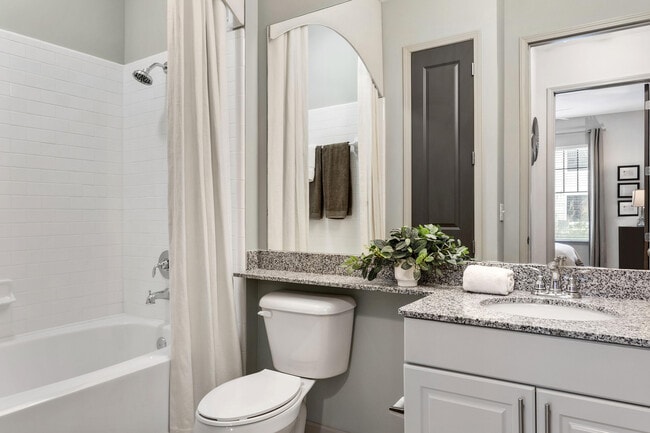 Experience modern elegance in this beautifully designed bathroom space. - Rowe Vinings