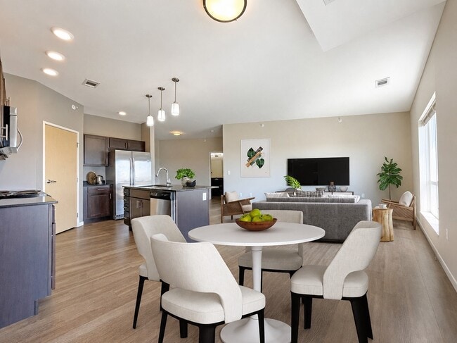 Elevate your lifestyle at Coulee Ridge Apartments, where modern elegance meets comfort. This spacious living area showcases stylish finishes and natural light, perfect for relaxing or entertaining. Schedule your tour today and envision your new home! - Coulee Ridge Apartments and Twin Homes