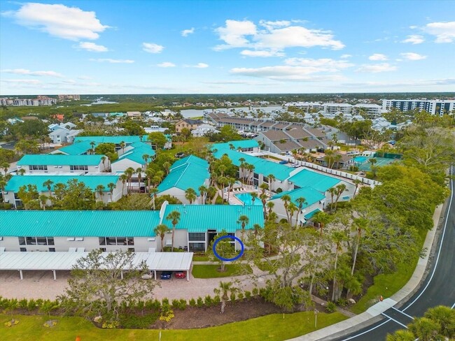 Building Photo - 5631 Midnight Pass Rd Unit 1001