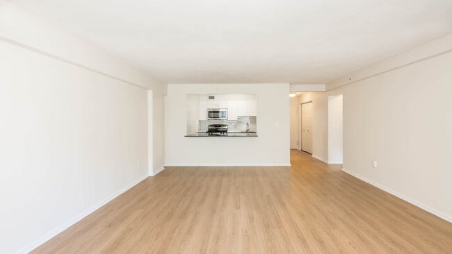 Living and Dining Room with Hard Surface Flooring - Emerson Place