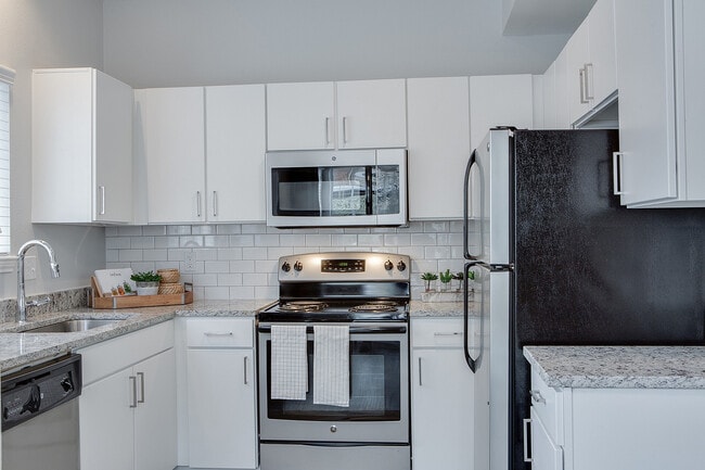 Building Photo - The Palmer at Las Colinas