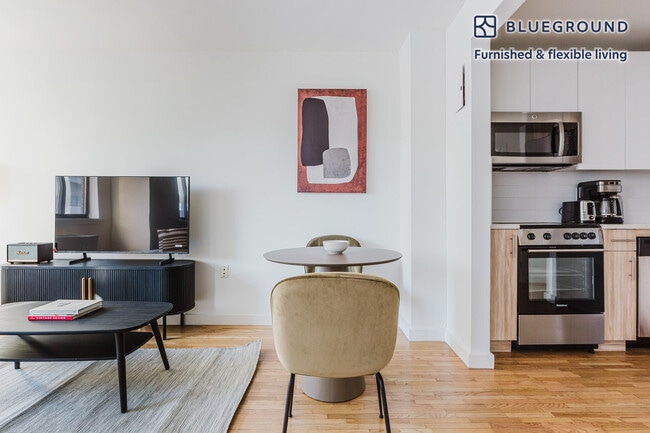 Photo - 309 W 30th St Unit FL7-ID1758