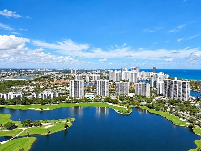 Building Photo - 3675 N Country Club Dr Unit 1006