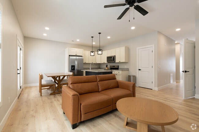 3BR, 2.5BA - 1,460SF - Living Room - Ridge Pointe Duplexes
