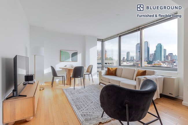 Building Photo - 4-75-75 48th Ave Unit FL9-ID2156