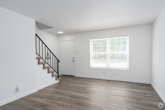 2BR, 2BA - 1,440SF - Living Room - Chez Paree