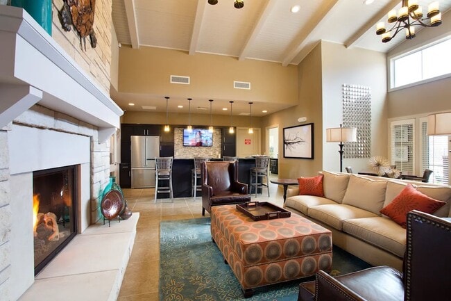 Step into the inviting lounge of SunStone at Fox Ridge, where modern comfort meets stylish design. Relax by the cozy fireplace or unwind on plush seating. Immerse yourself in a community that feels like home. Schedule a tour today! - SunStone at Fox Ridge