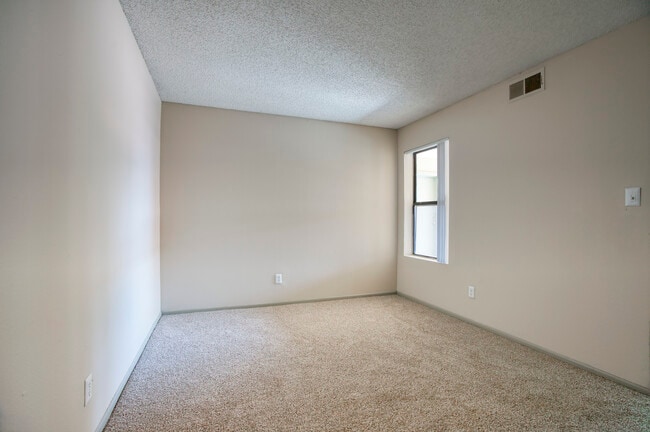 The bedroom includes a large closet and sits next to the full bathroom - Heritage District