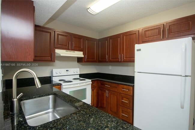 Photo - 9491 Palm Cir S Unit 101