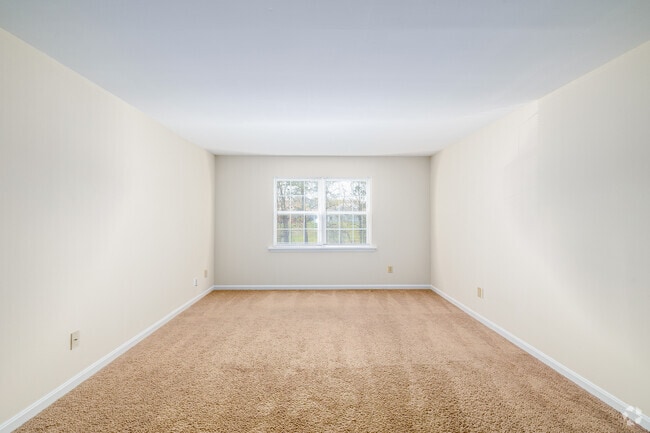 2BR, 1BA - 875SF - Living Room - Woodscape Apartments