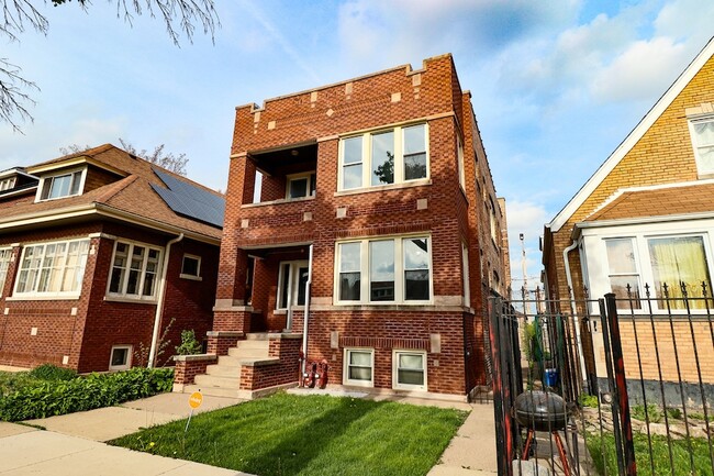 Building Photo - 6633 S Campbell Ave Unit 2