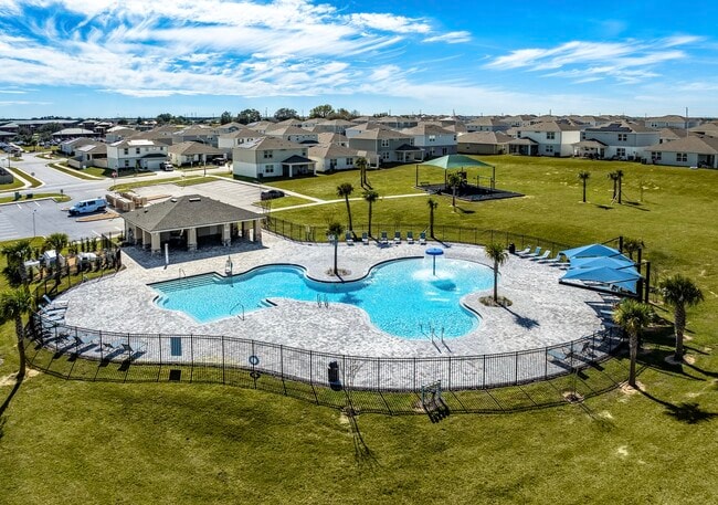 Resort-style pool with splash feature, cabana, and plenty of room to unwind. - Cedar Ridge