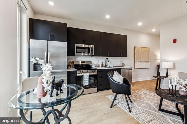 Building Photo - 6910 Ridge Ave Unit 306