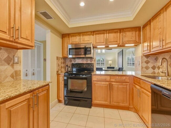 Building Photo - 9810 Marina Blvd Unit 1136