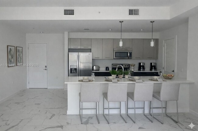 Building Photo - 101 E Camino Real Unit PH07