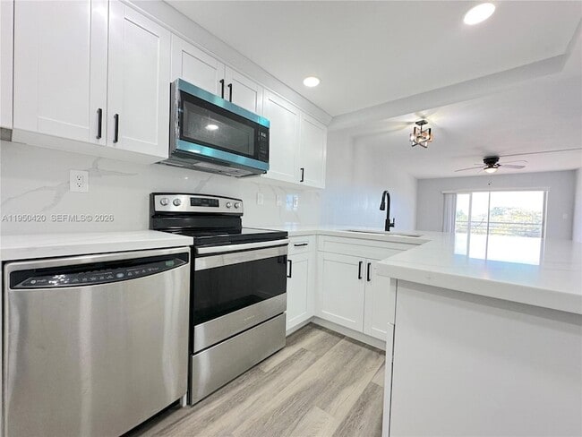 Photo - 3110 N Pine Island Rd Unit 408